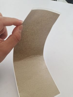 Sistema de contacto de mica flogopita flexível colada para trás
