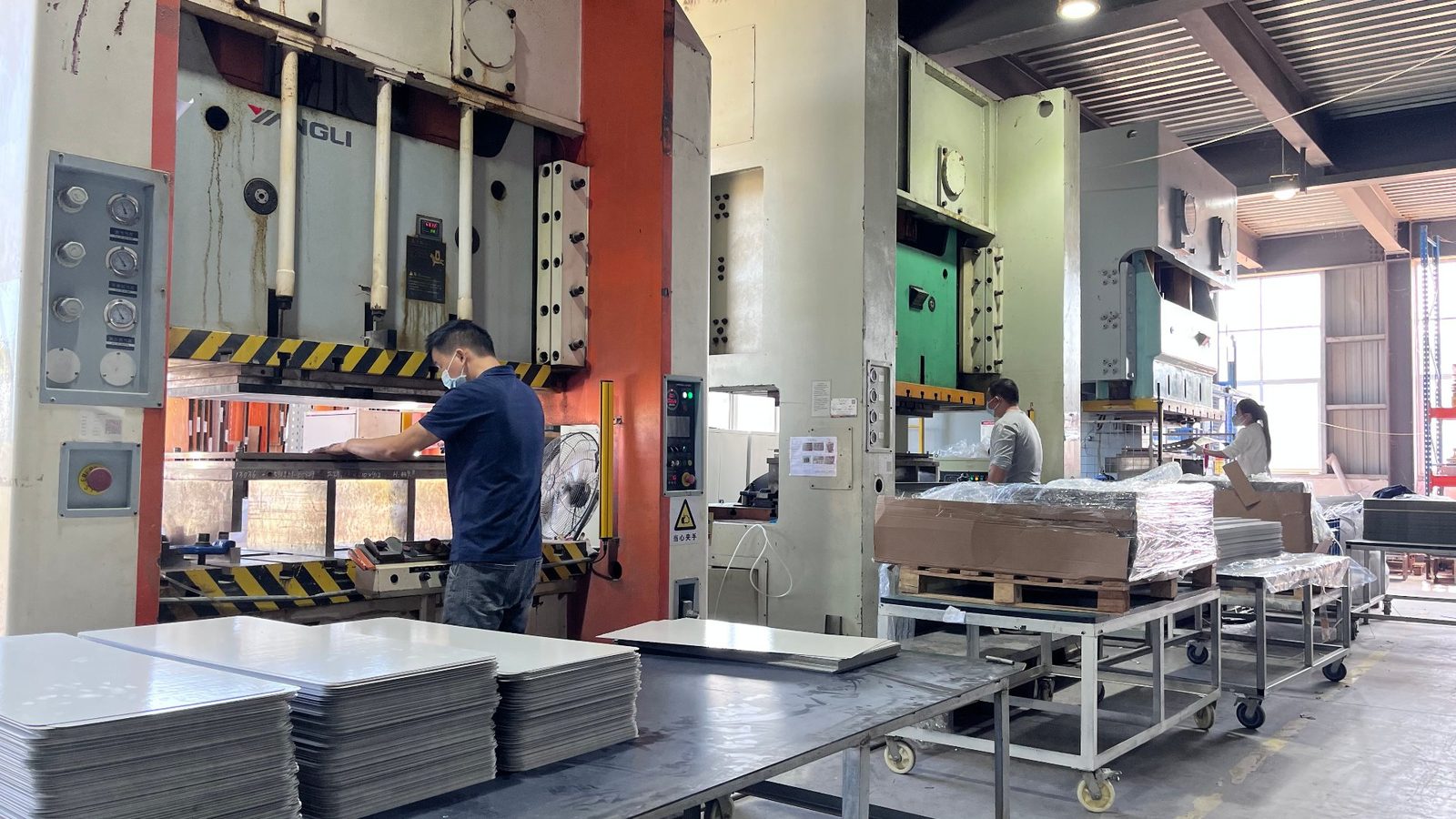 Mica sheet stamping and inspection workshop